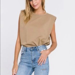 Size large camel color sleeveless top with shoulder pads